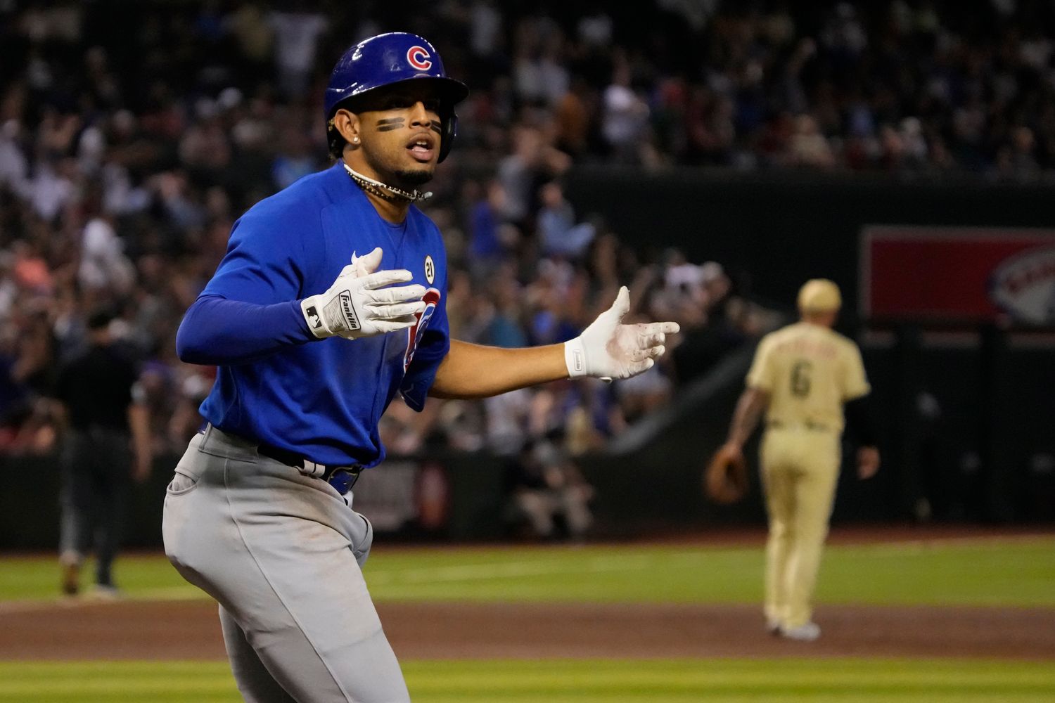 Sep 15, 2023; Phoenix, Arizona, USA; Chicago Cubs second baseman Christopher Morel (5) reacts after hitting a solo home run against the Arizona Diamondbacks in the ninth inning at Chase Field. Mandatory Credit: Rick Scuteri-USA TODAY Sports  